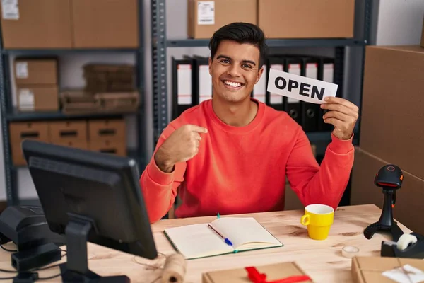 Hispanic Man Working Small Business Ecommerce Holding Open Banner Pointing — Stock Photo, Image