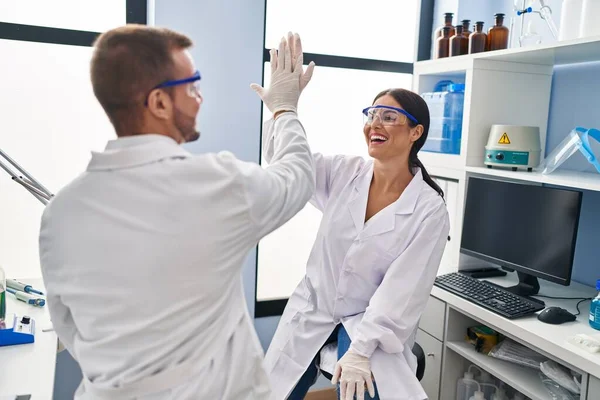 Man Woman Scientist Partners High Five Hands Raised Laboratory — Stockfoto