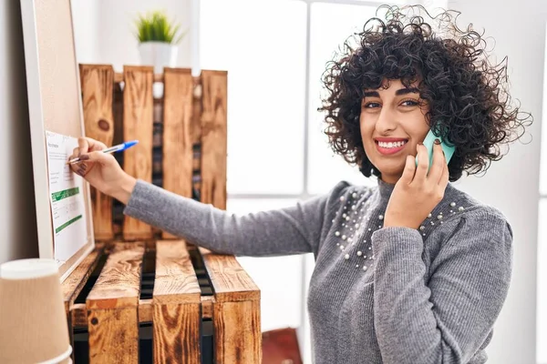 Young Middle East Woman Business Worker Talking Smartphone Writing Cork — Stock Photo, Image