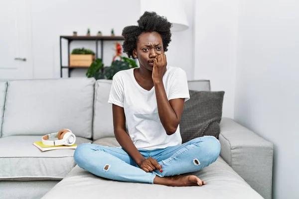 African Young Woman Sitting Sofa Home Looking Stressed Nervous Hands — Stockfoto