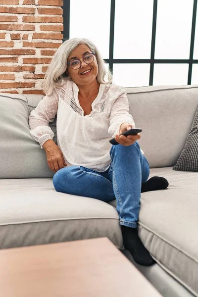 Middle Age Woman Watching Movie Sitting Sofa Home — Stock fotografie
