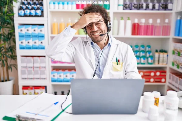 Hispanic Young Man Working Pharmacy Drugstore Working Laptop Stressed Frustrated — Stock Photo, Image