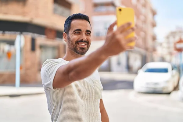Young Hispanic Man Smiling Confident Making Selfie Smartphone Street — Stok fotoğraf