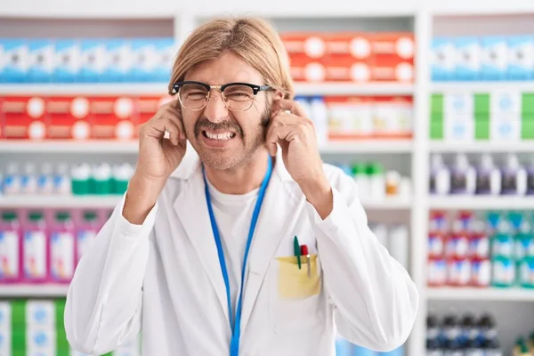 Caucasian Man Mustache Working Pharmacy Drugstore Covering Ears Fingers Annoyed — Stock Photo, Image