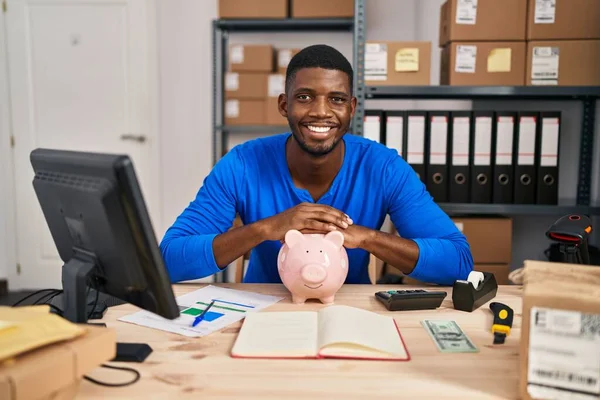 African American Man Working Small Business Ecommerce Piggy Bank Smiling — Stockfoto