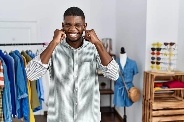 Young African American Man Working Manager Retail Boutique Covering Ears — Stok fotoğraf
