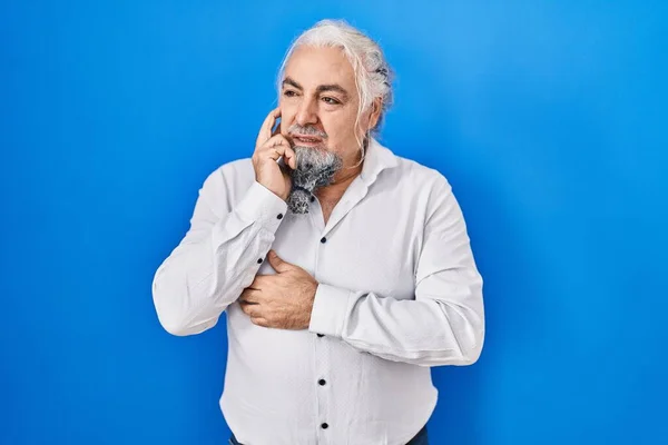 Middle Age Man Grey Hair Standing Blue Background Looking Stressed — Foto de Stock