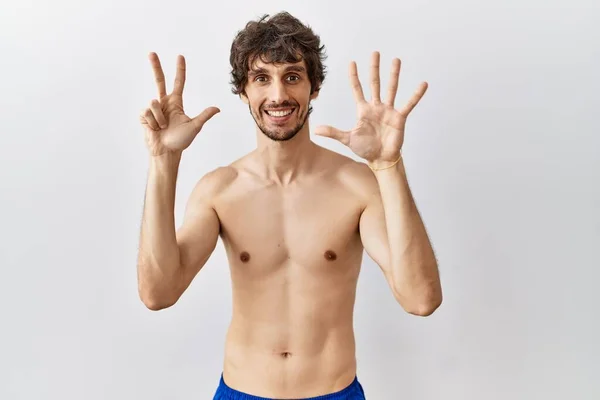 Young Hispanic Man Standing Shirtless Isolated Background Showing Pointing Fingers — Stock Photo, Image