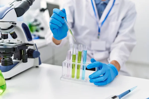 Young Blond Man Scientist Pouring Liquid Test Tube Laboratory — Stock Photo, Image