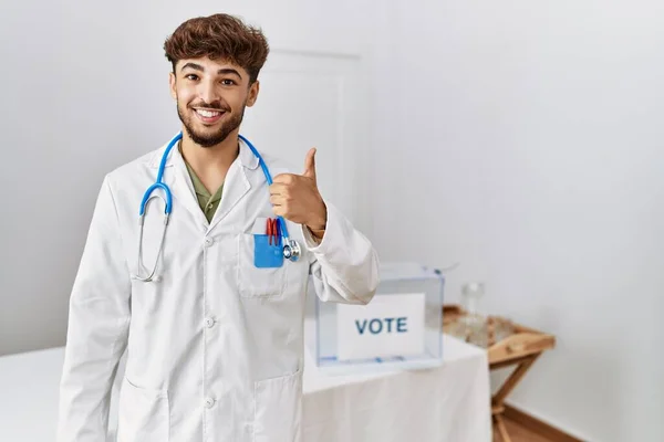 Young Arab Doctor Man Political Election Ballot Smiling Happy Positive — Stockfoto