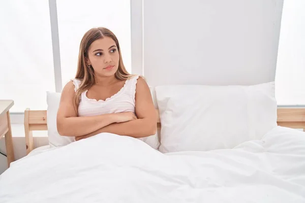 Young Beautiful Hispanic Woman Sitting Bed Unhappy Expression Arms Crossed — Stockfoto