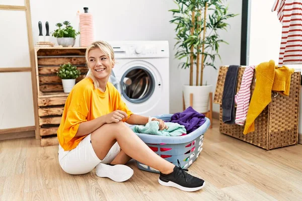 Young Caucasian Woman Putting Dirty Laundry Washing Machine Looking Away — Stock Photo, Image