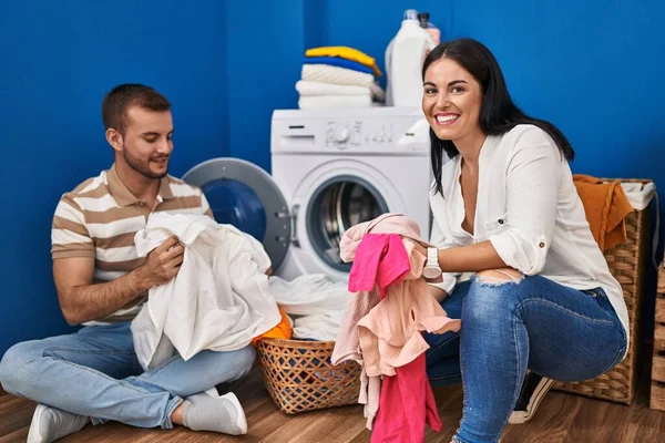 Man Woman Couple Smiling Confident Washing Clothes Laundry Room — Zdjęcie stockowe