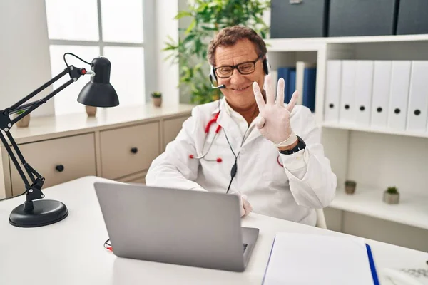 Senior Doctor Man Working Online Appointment Showing Pointing Fingers Number — Stock Photo, Image