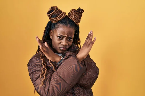 African Woman Braided Hair Standing Yellow Background Rejection Expression Crossing — ストック写真