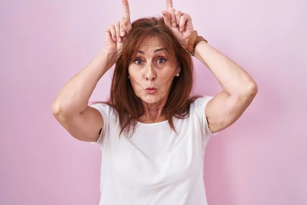 Middle Age Woman Standing Pink Background Doing Funny Gesture Finger — Stock Photo, Image