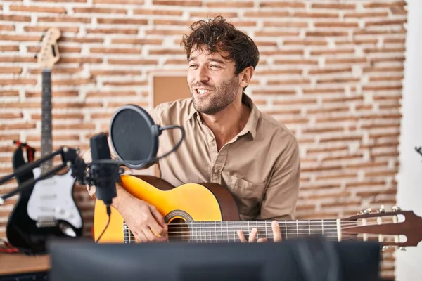 Young Man Musician Singing Song Playing Classical Guitar Music Studio — Fotografia de Stock