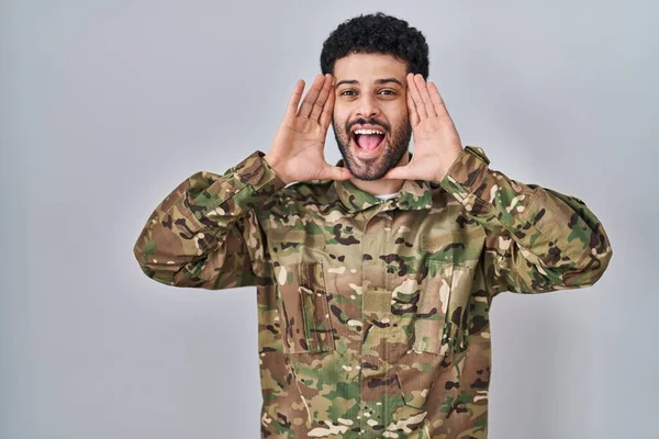 Arab Man Wearing Camouflage Army Uniform Smiling Cheerful Playing Peek — Stock Photo, Image