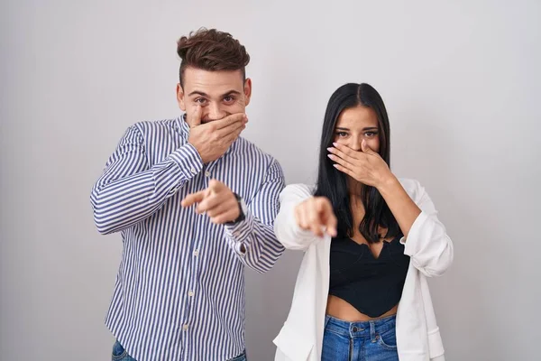 Young Hispanic Couple Standing White Background Laughing You Pointing Finger — Stock Photo, Image