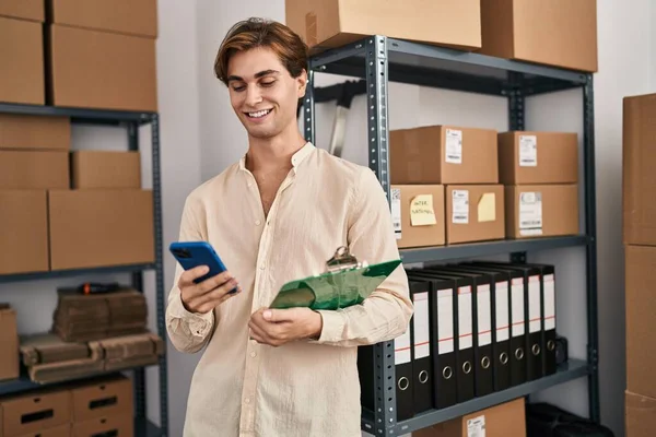 Young Caucasian Man Ecommerce Business Worker Using Smartphone Reading Document — Stockfoto