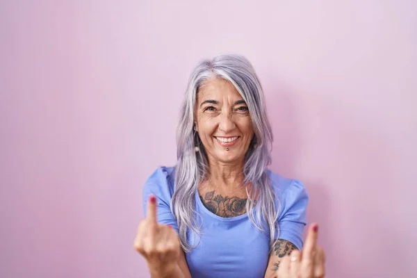 Middle Age Woman Tattoos Standing Pink Background Showing Middle Finger — Fotografia de Stock