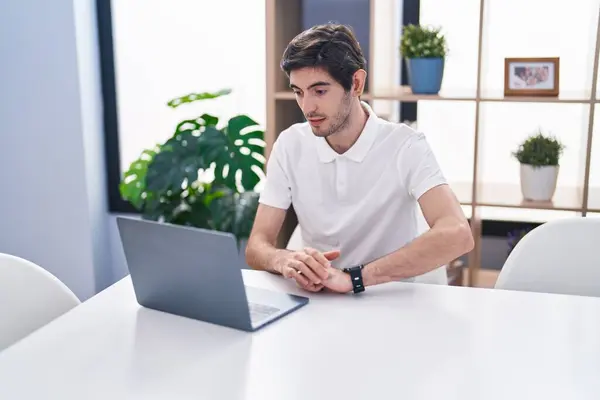 Young Hispanic Man Using Laptop Relaxed Expression Home —  Fotos de Stock