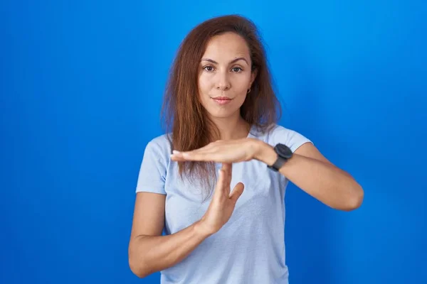 Brunette Woman Standing Blue Background Doing Time Out Gesture Hands — Stock Photo, Image
