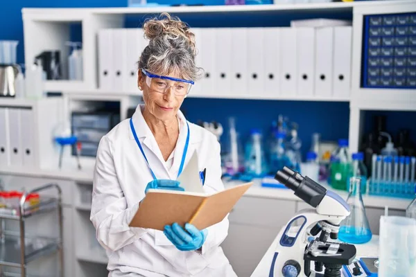 Middle Age Woman Scientist Reading Book Laboratory — Stock Photo, Image