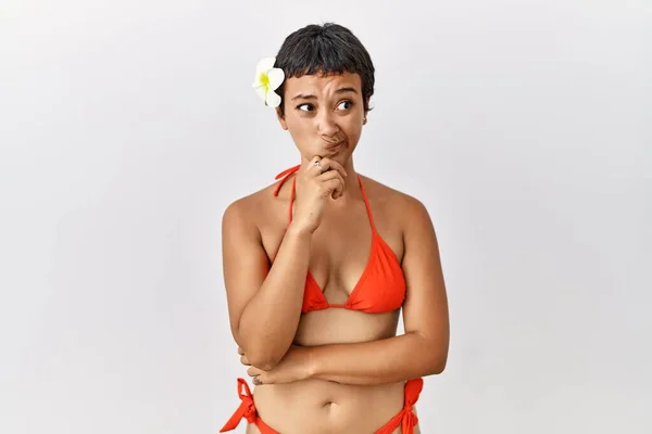 Young Hispanic Woman Short Hair Wearing Bikini Thinking Worried Question —  Fotos de Stock