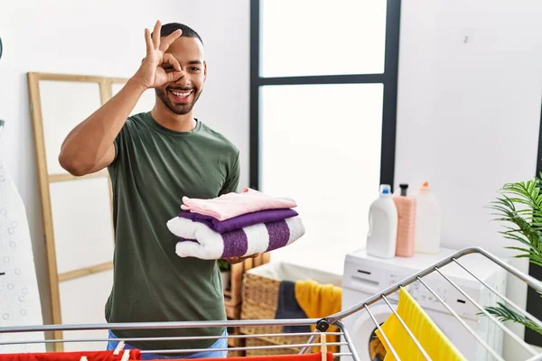 African American Man Holding Folded Laundry Clothline Smiling Happy Doing — Stockfoto