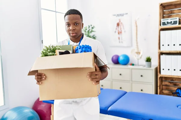 Young African Man Fired Holding Box Personal Items Physiotherapy Clinic — Stock Photo, Image