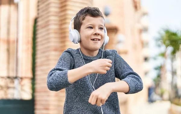 Blond Child Smiling Confident Listening Music Dancing Street — стоковое фото