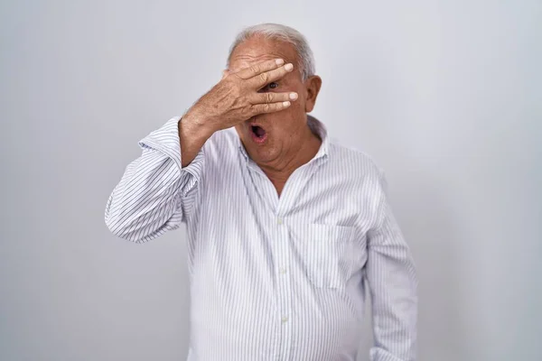 Senior Man Grey Hair Standing Isolated Background Peeking Shock Covering — Stok fotoğraf
