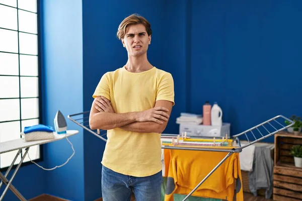 Young Man Doing Laundry Clueless Confused Expression Doubt Concept — Foto Stock