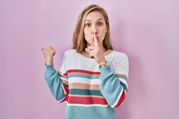 Young Blonde Woman Standing Pink Background Asking Quiet Finger Lips — Stock Photo, Image