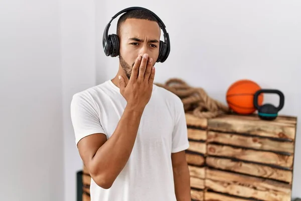 African American Man Listening Music Using Headphones Gym Bored Yawning — Stock Photo, Image