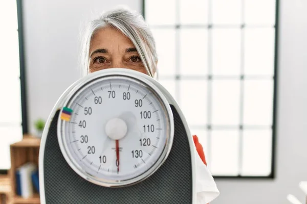 Middle Age Grey Haired Woman Covering Face Weighing Machine Home — Foto Stock