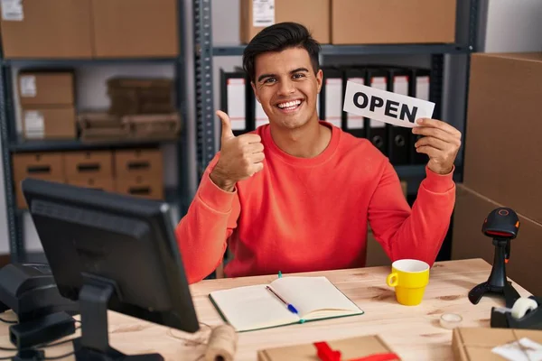 Hispanic Man Working Small Business Ecommerce Holding Open Banner Smiling — Stock Photo, Image