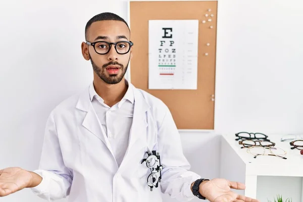 African American Optician Man Standing Eyesight Test Clueless Confused Open — Stockfoto