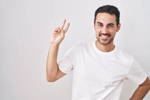 Handsome Hispanic Man Standing White Background Smiling Looking Camera Showing — 图库照片