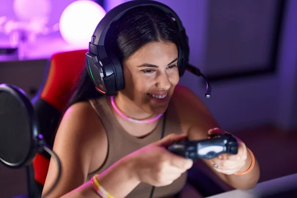 Young Beautiful Hispanic Woman Streamer Playing Video Game Using Joystick — Stok fotoğraf