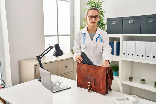 Young Doctor Woman Clinic Skeptic Nervous Frowning Upset Because Problem —  Fotos de Stock