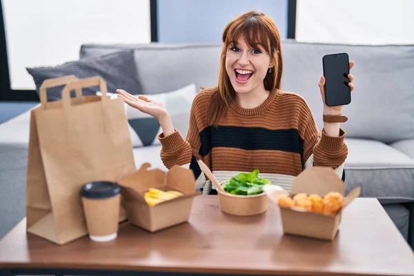 Young Beautiful Woman Eating Delivery Food Living Room Celebrating Achievement — Stockfoto