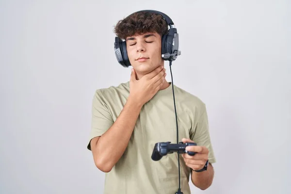 Hispanic Teenager Playing Video Game Holding Controller Touching Painful Neck — Stock Photo, Image