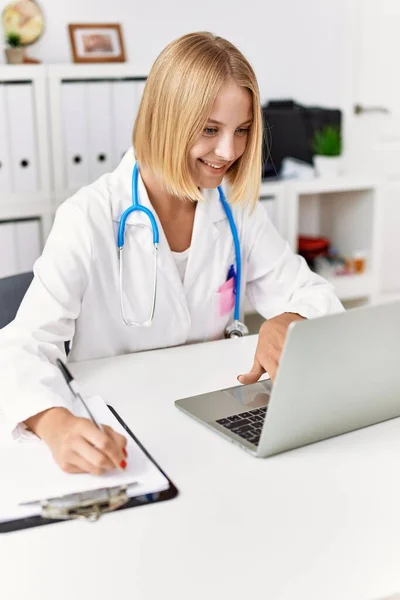 Young Blonde Woman Wearing Doctor Uniform Working Clinic — Photo