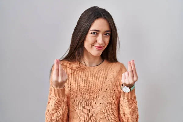 Young Brunette Woman Standing White Background Doing Money Gesture Hands — Stock Photo, Image