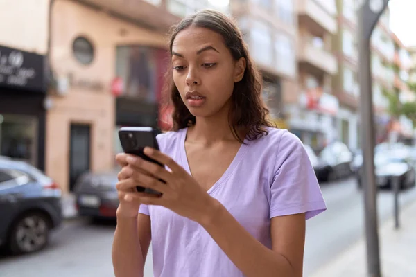 Young African American Woman Using Smartphone Serious Expression Street — Fotografia de Stock