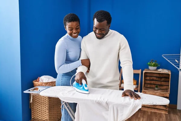 Man Woman Couple Smiling Confident Ironing Clothes Laundry Room — Stock Photo, Image
