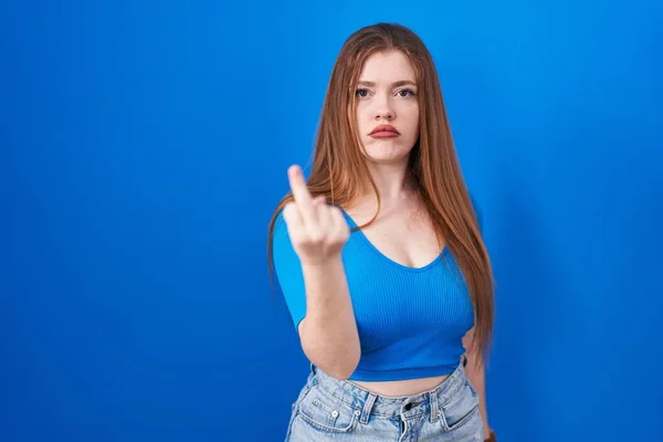Redhead Woman Standing Blue Background Showing Middle Finger Impolite Rude — Stockfoto