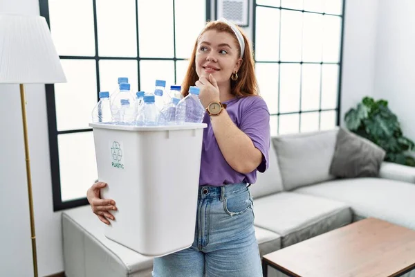 Young Redhead Woman Holding Recycling Wastebasket Plastic Bottles Hand Chin — Stock Photo, Image